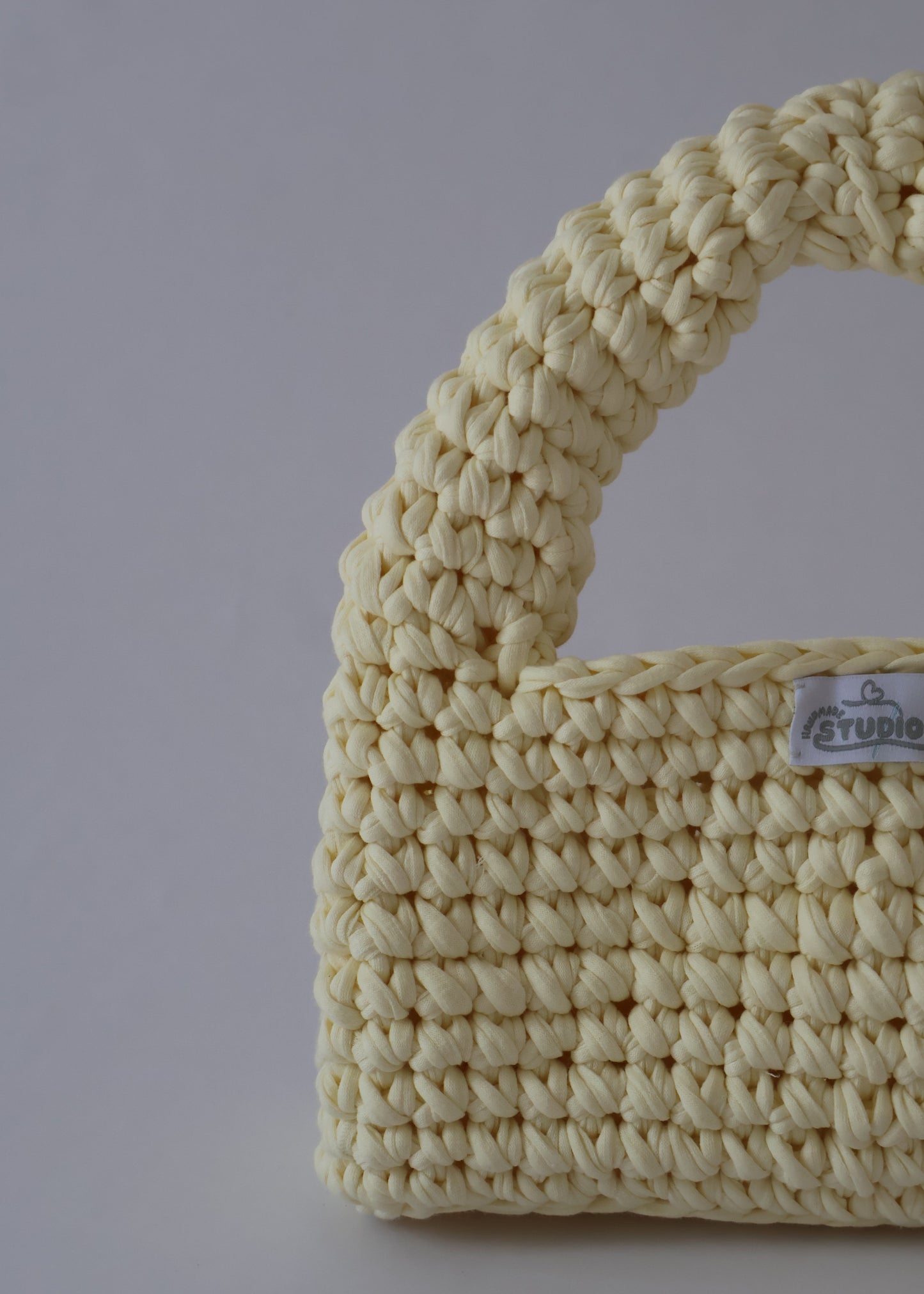 Add a pop of sunshine to your outfit with our hand-crocheted Butter Yellow Crush — lightweight, sustainable, and effortlessly cute!