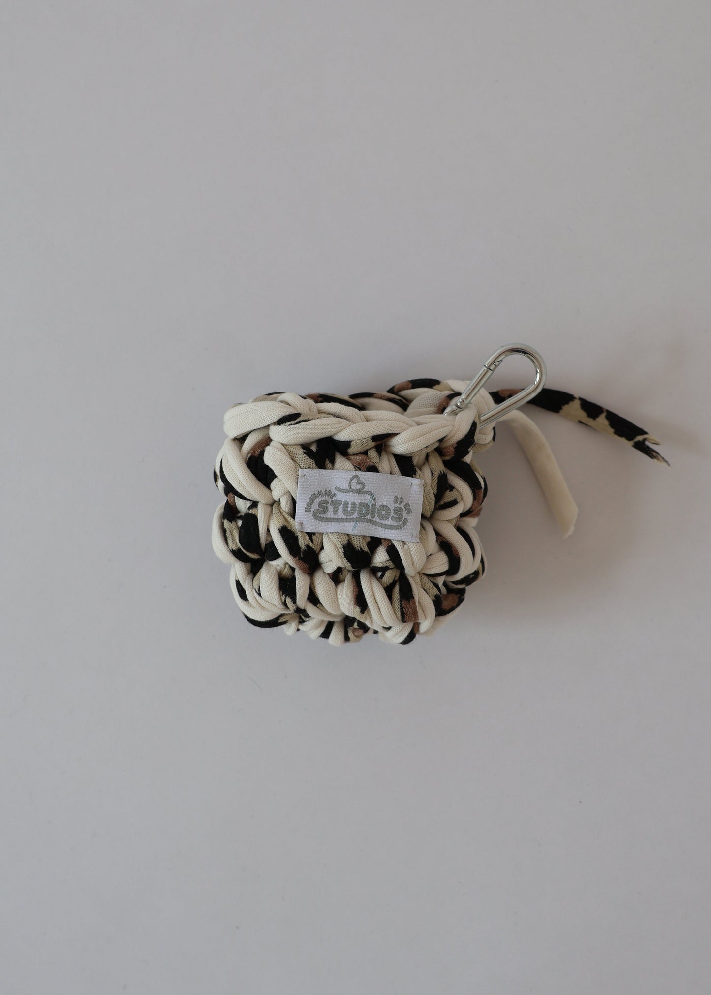 Protect your EarPods in style with our Wild Thing crochet case — bold, eco-friendly, and ready to clip and go wherever you do.
