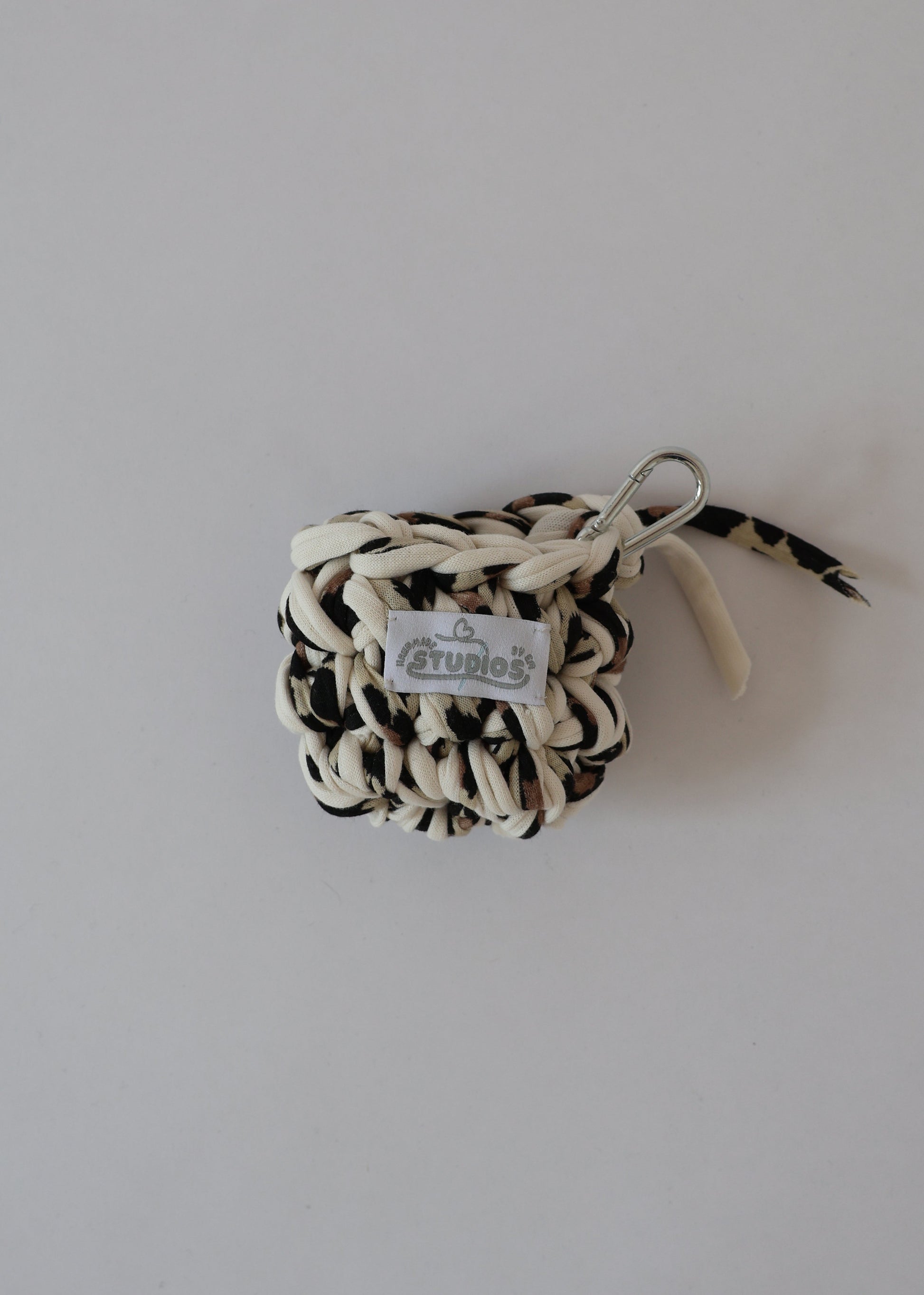 Protect your EarPods in style with our Wild Thing crochet case — bold, eco-friendly, and ready to clip and go wherever you do.