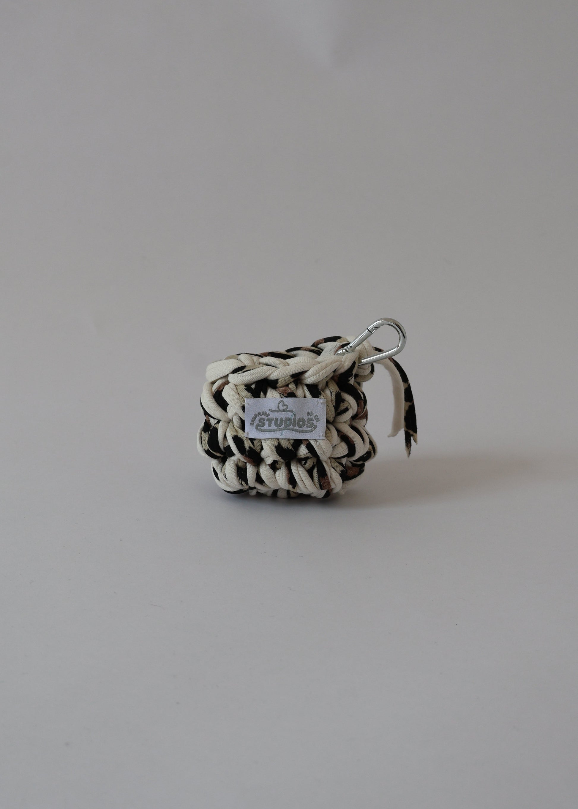 Protect your EarPods in style with our Wild Thing crochet case — bold, eco-friendly, and ready to clip and go wherever you do.